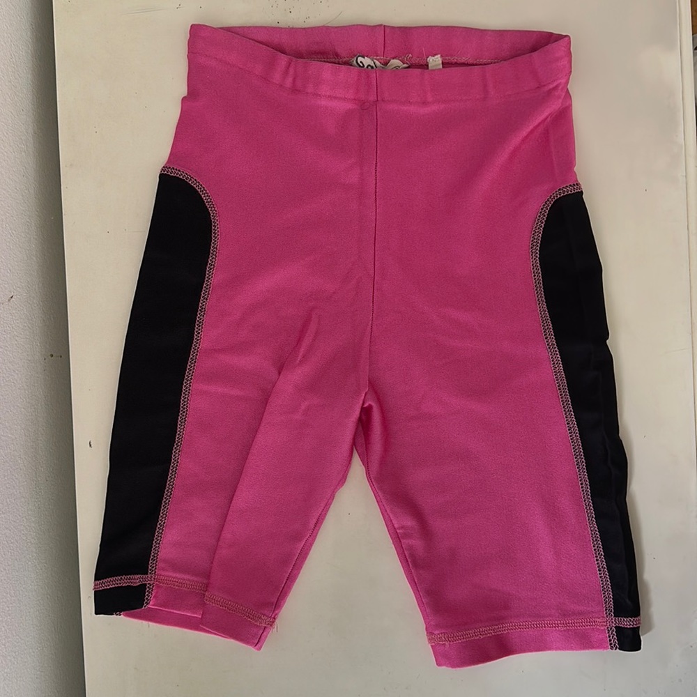 Neon pink and black biker shorts